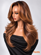 Front view of FORMI glueless honey blonde highlight layered human hair lace front wig with curtain bangs