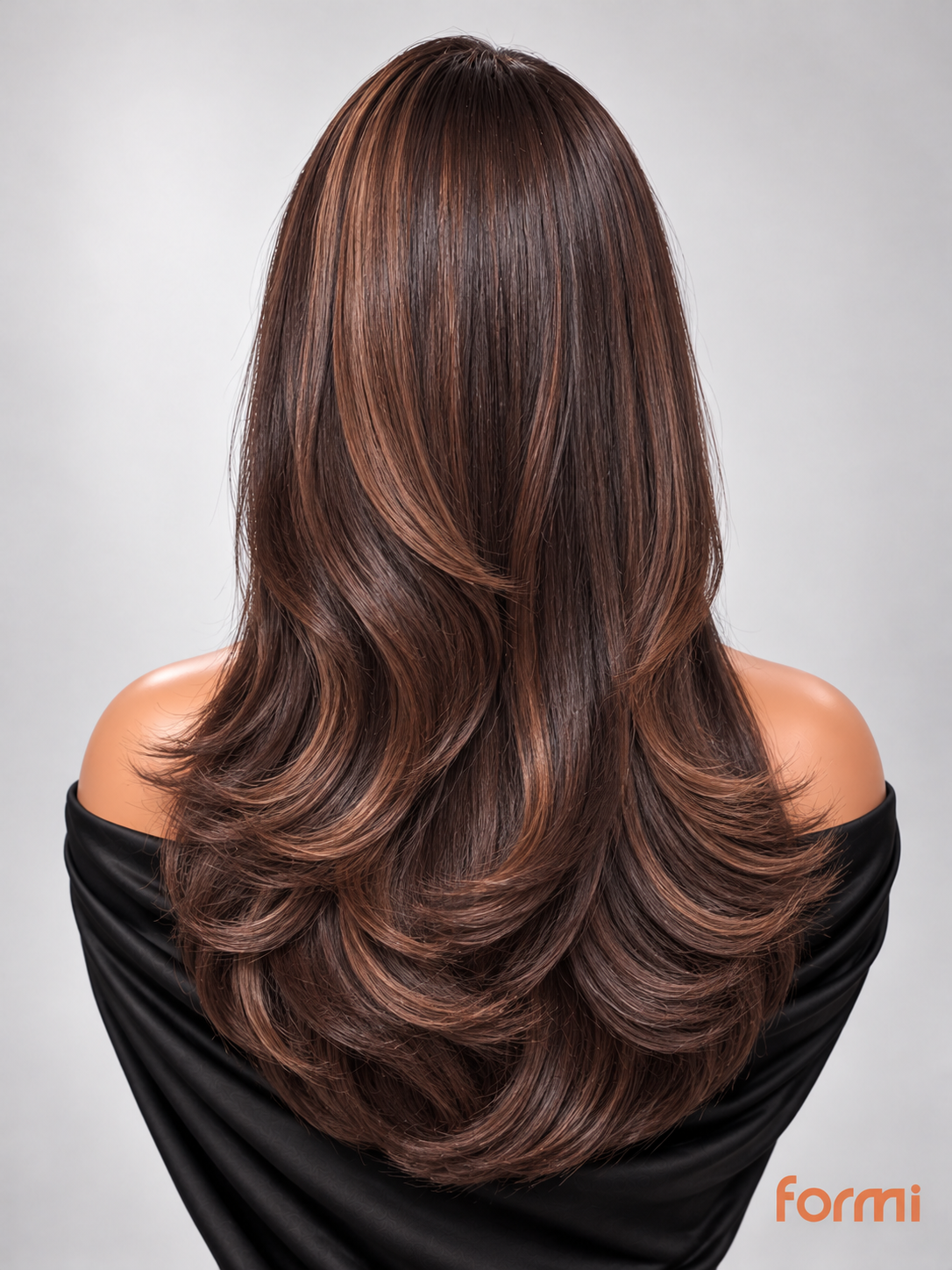 Back view of espresso brown caramel highlight layered human hair wig