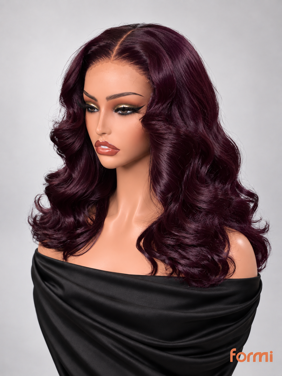 Three-quarter view of deep black-purple body wave human hair lace front wig