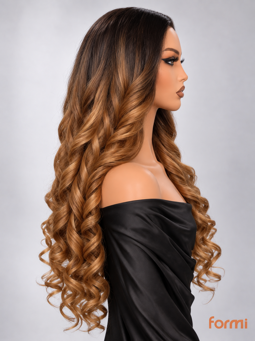 Warm honey caramel spiral curls texture close-up
