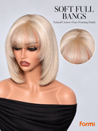 Close-up of wispy bangs and natural crown on #613 honey blonde bob human hair wig