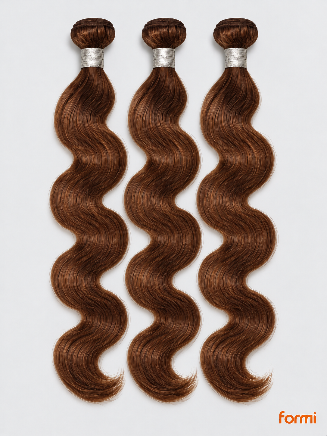 Three #30 auburn body wave human hair bundles with silver wraps on a pale gray background.