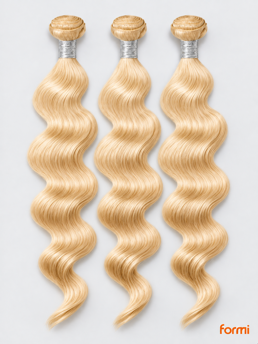 Three 613 blonde body wave human hair bundles with silver wraps on a pale gray background.